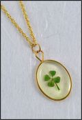 Oval Mirage Necklace with Four Leaf Clover