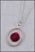 Silver Trimmed Oval Mirage Necklace with Burgundy Rose Petal