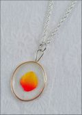 Silver Trimmed Oval Mirage Necklace with Yellow/Red Rose Petal