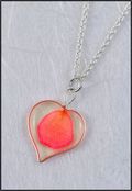 Silver Trimmed Heart Mirage Necklace with Pink Rose Petal