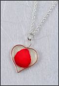 Silver Trimmed Heart Mirage Necklace with Red Rose Petal