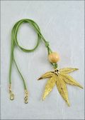 Gold Japanese Maple Necklace with Bead on Leather Cord