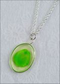 Silver Trimmed Oval Mirage Necklace with Green Rose Petal