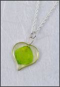 Silver Trimmed Heart Mirage Necklace with Apple Green Rose Petal