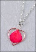 Silver Trimmed Heart Mirage Necklace with Fuchsia Rose Petal
