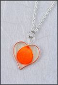 Silver Trimmed Heart Mirage Necklace with Orange Rose Petal