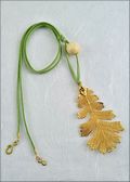 Gold Oak Necklace with Bead on Leather Cord