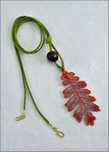 Iridescent Oak Leaf Necklace with Bead on Leather Cord