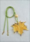 Gold Sugar Maple Leaf Necklace with Bead on Leather Cord