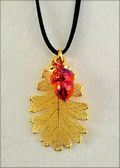 Double Small Gold Oak Leaf Necklace with Iridescent Acorn on Leather Cord