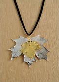 Double Small Silver Sugar Maple Necklace on Leather Cord