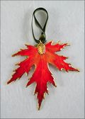 Silver Maple Leaf Ornament - Gold Trimmed in Burnt Orange