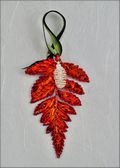 Iridescent Fern with Silver Pine Cone Ornament