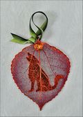 Coyote or Wolf Silhouette on Real Aspen Leaf in Iridescent Orn.