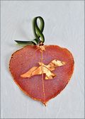 Wild Bird Silhouette on Real Aspen Leaf in Iridescent Ornament